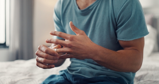 man removing wedding ring